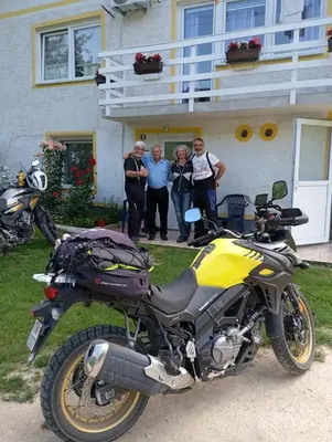 a group of people standing in front of a motorcycle at Home-Vasva and Hazim in Ćukovi