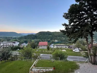 a view of a town with a road and houses at Holiday Home Ajaz Bihac in Bihać