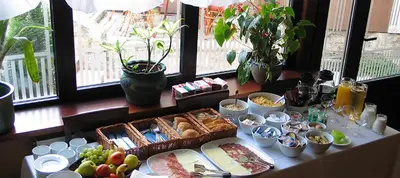 a table with a buffet of food on it at Hotel Stari grad in Jajce