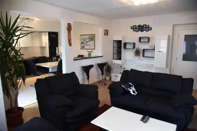 a living room with a couch and a table at Apartment Mario in Livno