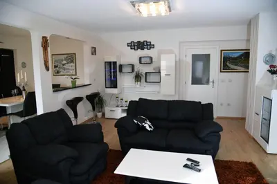 a living room with two couches and a table at Apartment Mario in Livno