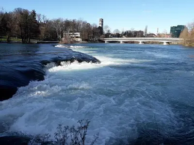 a river with white water rapids on top of it at Apartment Edin in Bihać