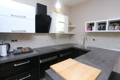a kitchen with a sink and a counter top at Farah Superior Apartments in Bihać