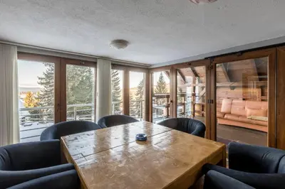 a conference room with a wooden table and chairs at Vlasic Nanna & Lalla in Vlasic