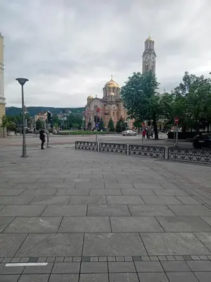 a city square with a building in the background at Apartment Top Centar in Banja Luka