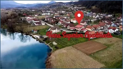 an aerial view of a town next to a body of water at Hana Superior Apartments in Bihać