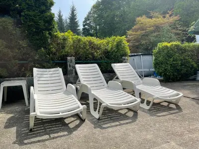 a group of four chairs and a table and sidx sidx sidx at Holiday Home Oaza Mira in Visoko