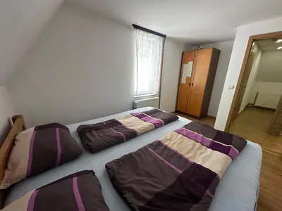 a bedroom with two beds in a room at Vikendica Anja in Vlasic