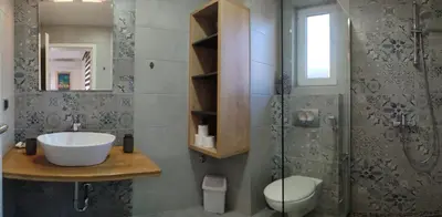 a bathroom with a sink and a shower and a toilet at Deluxe Villa Coast River Sarajevo in Visoko