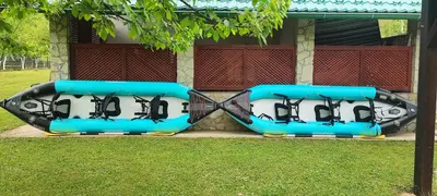 two planes are on display in front of a house at Mila Holiday Home in Lohovo