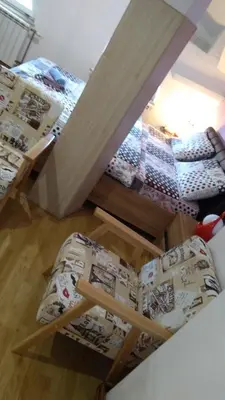 a room with three bunk beds in a room at Guesthouse Jelic in Teslić