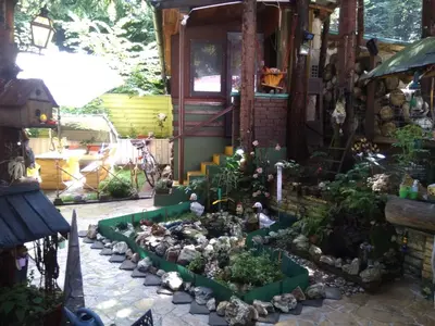 a garden in front of a house with plants at Holiday Home Nature Neno in Visoko