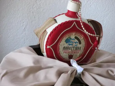 a christmas tree ornament on top of a dress at Country House Roman in Doboj