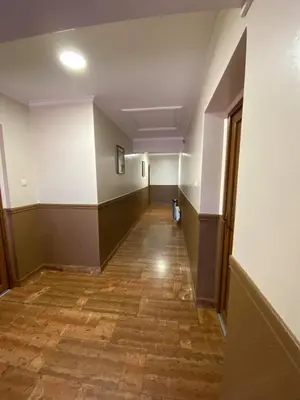 an empty hallway of an empty building with a hallway at Motel Tiron in Kakanj