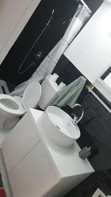 a bathroom with two toilets and a sink at Holidayhouse Visoko in Visoko