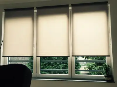 a window with white curtains in a living room at Apartment Adi in Travnik