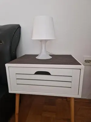 a white dresser with a lamp on top of it at Guesthouse Irac in Tuzla
