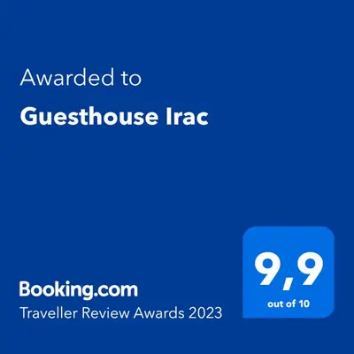 a blue screen with the text awarded to a guest house incac at Guesthouse Irac in Tuzla