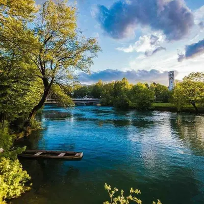 a boat in the water on a river at Konak na Uni in Bihać
