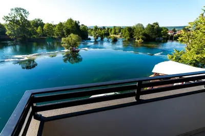 a view of a river from a bridge at Konak na Uni in Bihać