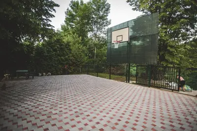 a basketball hoop in front of a building at Villa La Unica in Lohovo