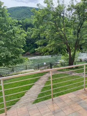 a fence with a view of a river at Holiday Homer Vila na Obali Vrbasa in Banja Luka
