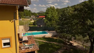 a view of a swimming pool from a building at Holiday Homer Vila na Obali Vrbasa in Banja Luka