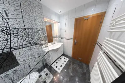 a bathroom with a sink and a mirror at Holiday Home Villa Sara in Bihać