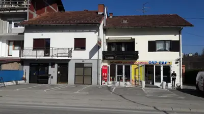 a building on the side of a street at Rooms Adrijana in Banja Luka