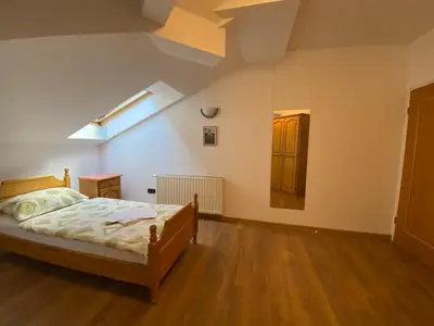 a bedroom with a bed and a skylight at Motel Vujeva in Livno