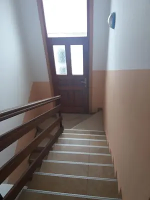 a staircase leading up to a door with a window at Motel Restoran Gurman in Banja Luka