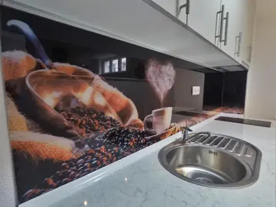 a kitchen with a sink and a counter top with a counter top at Studio apartman Centar in Banja Luka
