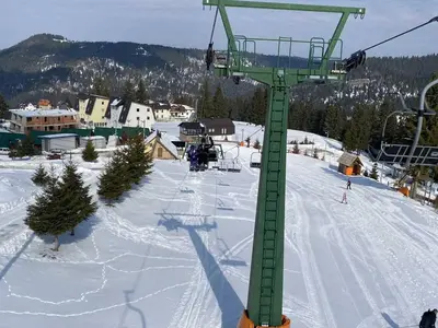a ski lift on a ski slope in the snow at MIMI 302 Eko Fis Vlasic in Vlasic