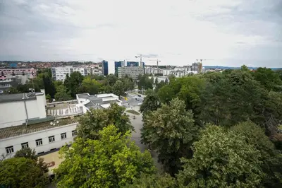 an aerial view of a city with trees and buildings at Apartman Penthaus u strogom centru Banja Luke in Banja Luka
