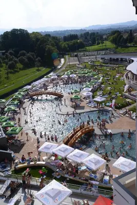 an overhead view of a swimming pool with people in it at Hotel Kardial in Teslić