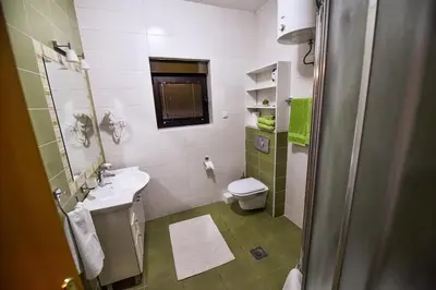 a bathroom with a toilet and a sink at Apartman Natalija Banja Luka in Banja Luka