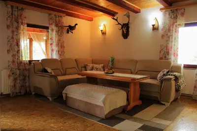 a living room with a couch and a table at 