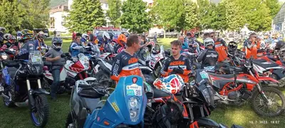 a large group of motorcycles parked in a field at Apartman M. Rados in Kupres