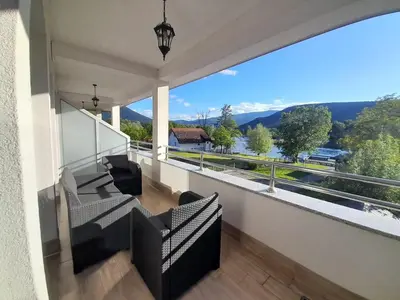 a balcony with a view of the mountains at Villa Al Nemah in Bihać