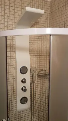 a shower in a tiled bathroom with a shower at Vlašićka priča Eko Fis in Vlasic