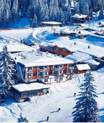a ski resort in the snow with people skiing at Vlašićka priča Eko Fis in Vlasic