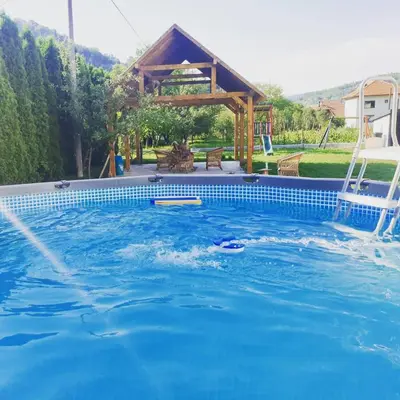 a person swimming in a swimming pool at Luxury house 