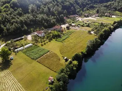 an aerial view of a large estate next to a river at Seosko domacinstvo Halil & Alema in Ćukovi