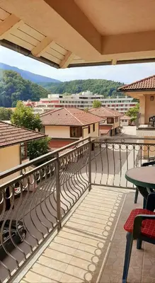 a balcony with a view of a city at Relax Apartman sa garažom in Fojnica
