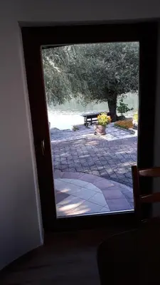 a view of a patio through a window at Hideaway in Bihać