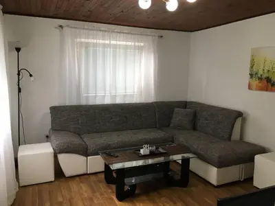 a living room with a couch and a coffee table at Luxury apartment in the heart of Jajce in Jajce