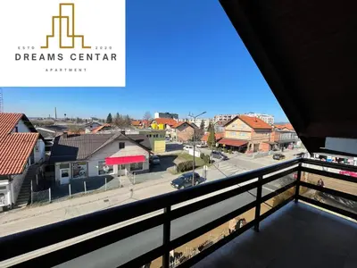 a view of a city from a balcony at Apartments Dreams Centar in Živinice