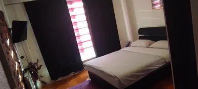 a bedroom with a bed and a window at Lara in Doboj