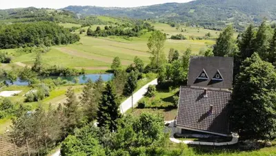 an aerial view of a house in a field at Apartment Stanic in Šipovo