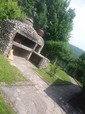 a stone oven sitting on top of a hill at Villa Happy dreams in Bihać